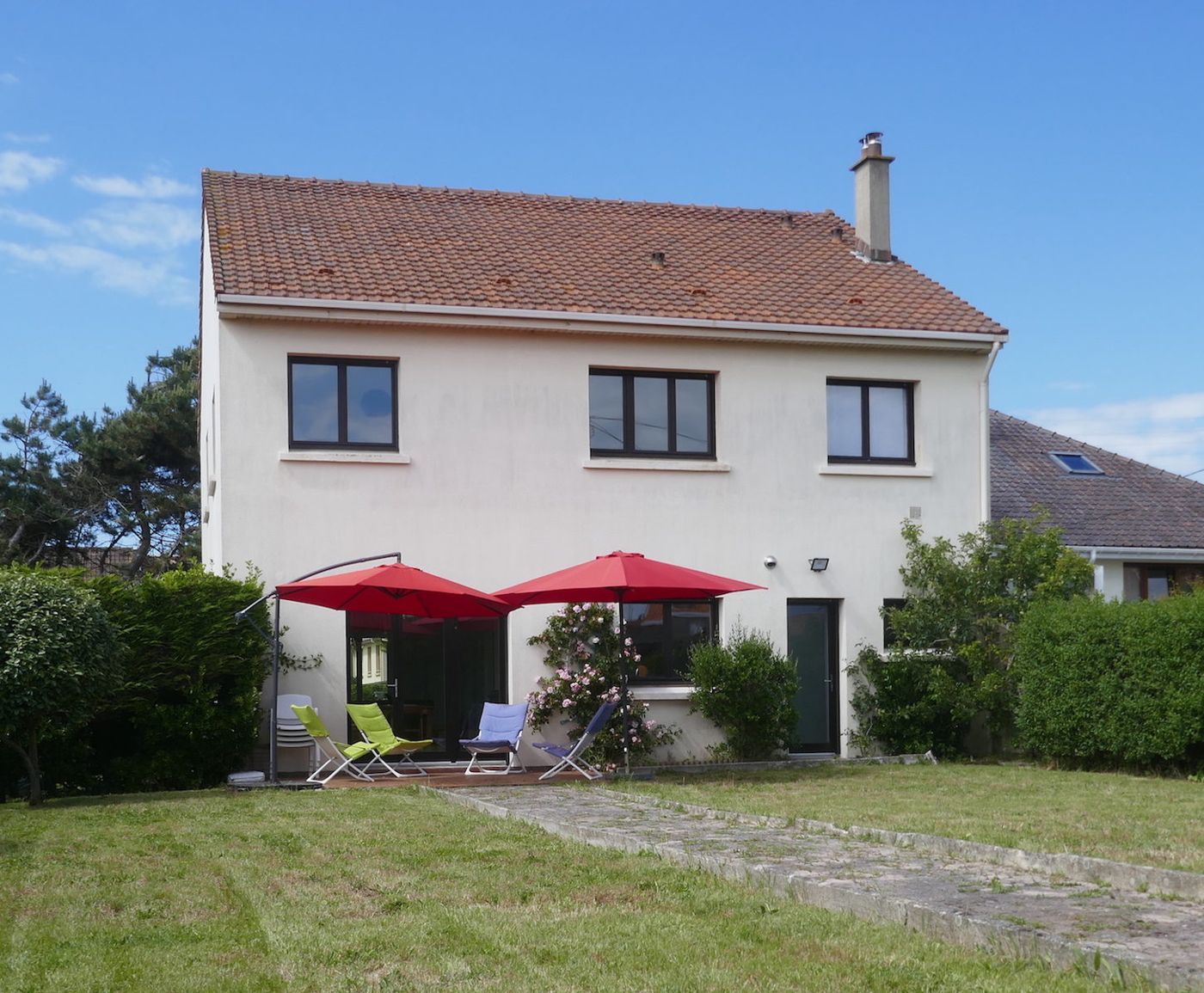 La maison Un air de famille, sa terrasse et son jardin