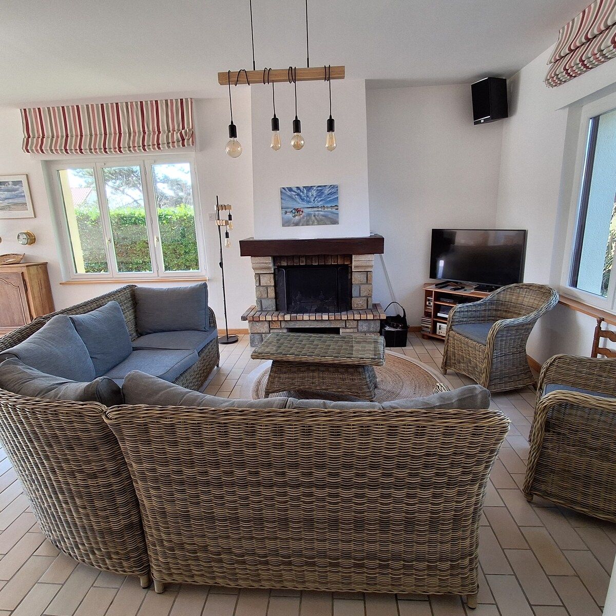 Sitting area with fireplace and TV